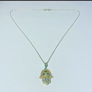 Hand of Fatima and necklace.